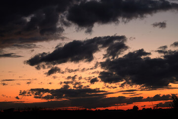 Dramatic sky on summer sunset. Beautiful clouds.
