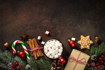 Christmas food concept. Hot chocolate, gingerbread cookies, present and holiday decorations. Top...