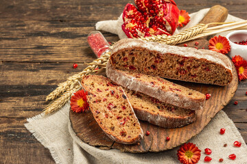 Whole grain bread with cranberry for holidays. Fresh homemade bakery, dry spikelets