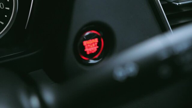 close up to the start stop engine button