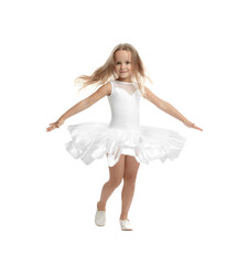 Naklejka premium Cute little girl in beautiful dress dancing on white background