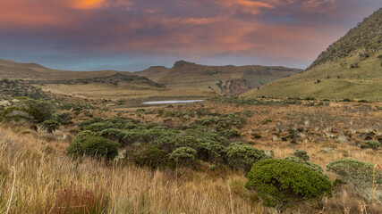 The majestic black lagoon in the snowy park where the Nevado del Ruiz, Nevado del Tolima and the Nevado Santa Isabel are located