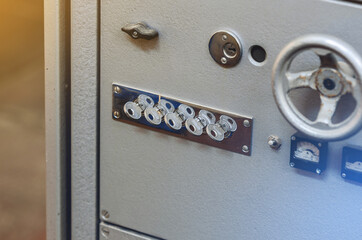 Part of an old safe. Keys. Industrial background