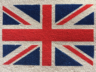 Fototapeta premium Union Jack flag, on textured fabric