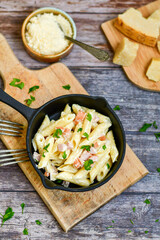  Fresh home made italian  penne  pasta   alla carbonara with  cream sauce  ,  bacon,egg, parmesan cheese ,olive oil and black pepper) 