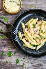  Fresh home made italian  penne  pasta   alla carbonara with  cream sauce  ,  bacon,egg, parmesan cheese ,olive oil and black pepper) 