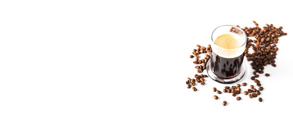 Isolated espresso shot flat lay view with coffee beans over white.