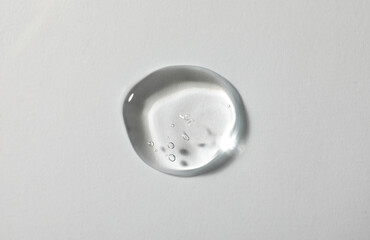 Sample of cosmetic gel on white background, top view