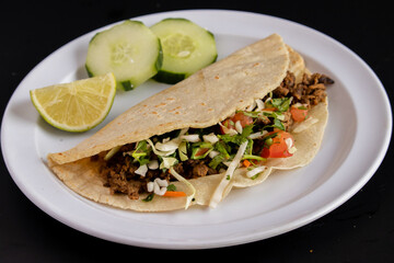 Carne asada taco with a corn tortilla