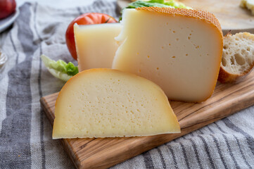 Cheese collection, French fol epi  cheese with many little holes, etorki  and ossau iraty cheese