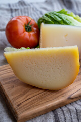 Cheese collection, French fol epi  cheese with many little holes and ossau iraty cheese