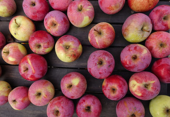 Red apples on the table. Background image