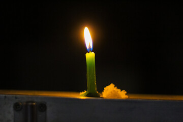 candle with flame on diwali celebration