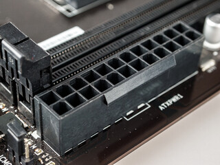 connector for connecting the main power cable to the computer motherboard and the processor power...