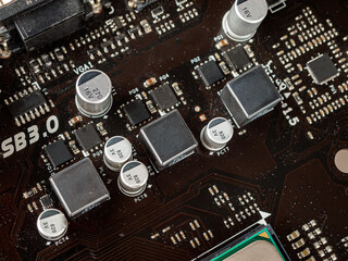 CPU power supply circuit on the motherboard, mosfets, solid-state capacitors, chokes, field-effect...