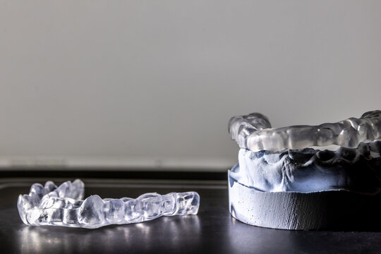 Dental splint against bruxism and grinding teeth with teeth imprint and dental healthcare of an orthodontist as dental protection in a medical dentistry is important to keep the teeth healthy