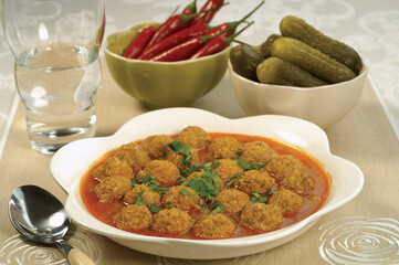 Turkish food Sulu Kofte / Juicy Meatballs Soup with Bran Bread.