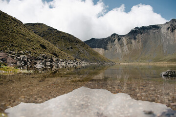 Fototapeta premium Volcano reflection in a lake in mexico