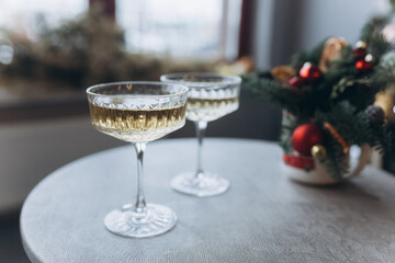Glasses of wine with romantic christmas decoration. Holiday, new year concept
