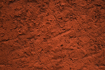 Red-brown colored cement plaster wall texture