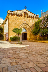 Fototapeta na wymiar Second Station of Way of Cross -Place of Placement of Cross.Church of Flagellation is Roman Catholic church in Franciscan monastery. located in Muslim Quarter of Old City of Jerusalem, Israel