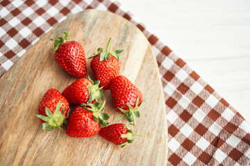fresh strawberries on wooden board fruit vitamins summer