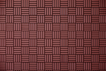 Red tile wall with geometric pattern as background material