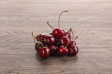 Ripe sweet cherry berries heap