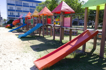 Fototapeta na wymiar Children's slide in a city park