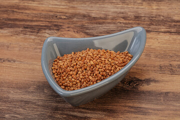 Raw buсkwheat cereal in the bowl