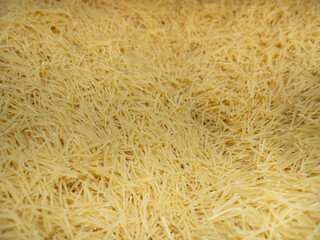 Background from noodles. Pasta. The counter in the car.