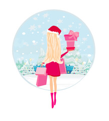 Fototapeta na wymiar Winter girl with gift box, holiday sale card