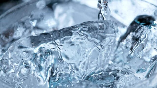 Super slow motion of pouring Vodka drink. Filmed on high speed cinema camera, 1000fps.