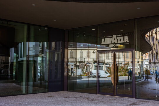 TURIN - NOV 11: Entrance group from the facade of the Lavazza headquarters building. November 08, 2021 Turin, Piedmont, Italy.