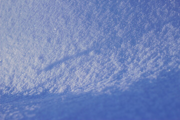 textured snow background with shadows in frosty day