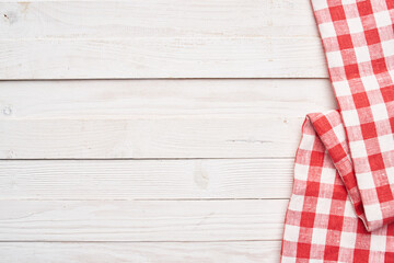 Red checkered tablecloth wooden background texture kitchen decoration