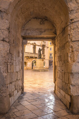 Fototapeta na wymiar Stone passage to the Fruit Square in the old town of Split, Croatia, Europe.