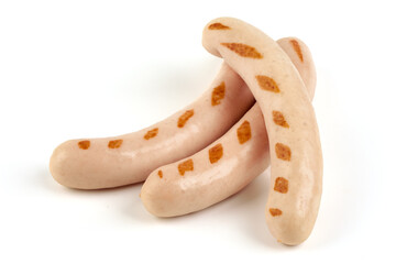 Grilled white thin sausages, isolated on white background.