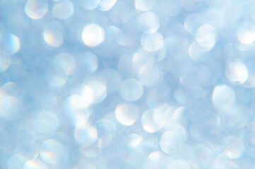 Obraz premium bright glitter background: bokeh effect from many colored lights on frozen glass, toning