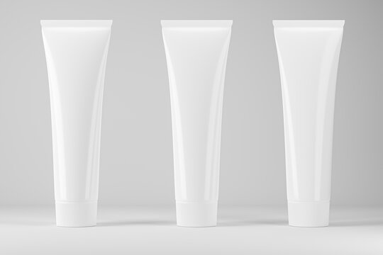 Mockup of three tubes in white. 3d render.
