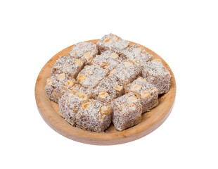 Turkish delight sweets on a wooden stand..