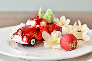 Holiday place setting for Christmas decorative table for seasonal dinner party or fancy wedding