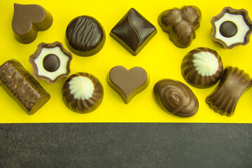 Top view of a variety of chocolate pralines for Valentine´s day.