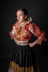 Young beautiful slovak woman in traditional dress. Slovak folklore