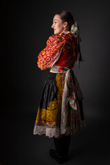 Young beautiful slovak woman in traditional dress. Slovak folklore