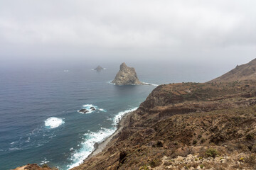 Natural landscape of the northern part of the island in Las Palmas De Anaga. In the background, the Atlantic Ocean and Roques de Anaga. Tenerife. Canary Islands. Spain.