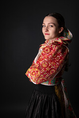 Young beautiful slovak woman in traditional dress. Slovak folklore