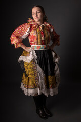 Young beautiful slovak woman in traditional dress. Slovak folklore