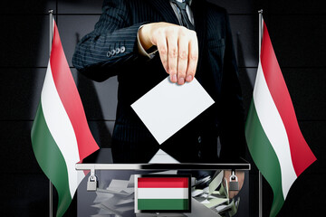 Hungary flags, hand dropping voting card - election concept - 3D illustration