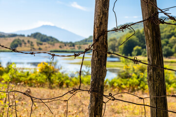 View of Biviere lake with Etna volcano, Nebrodi National Park, Sicily, Italy